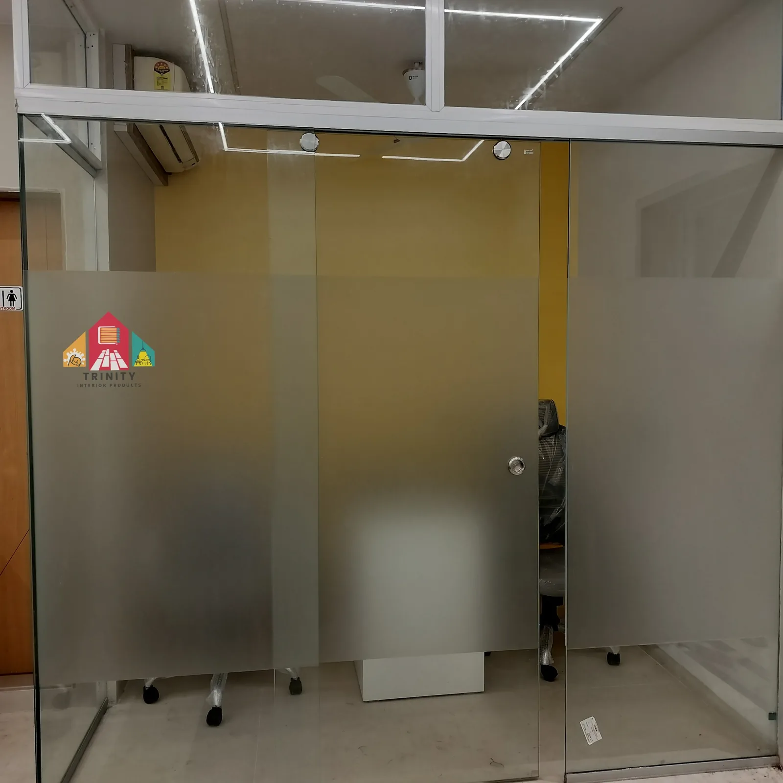 Glass film installation by Trinity Interior Products